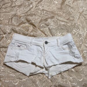 White Hollister Distressed Low-Rise Mini Jean Shorts